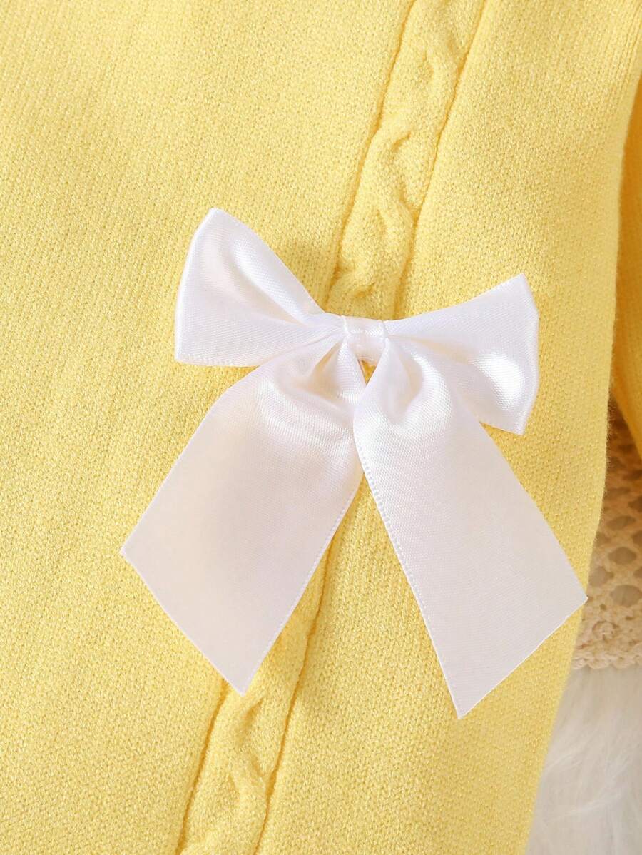 Souflis Souflis Babymeisjestrui, gebreide coltrui, lange mouwen jumpsuit met voetjes, comfortabel voor herfst/winter, handgemaakte strikdecoratie, elegant kabelontwerp, veelzijdig voor dagelijks gebruik, binnen, buiten, reizen, geel/lichtgeel